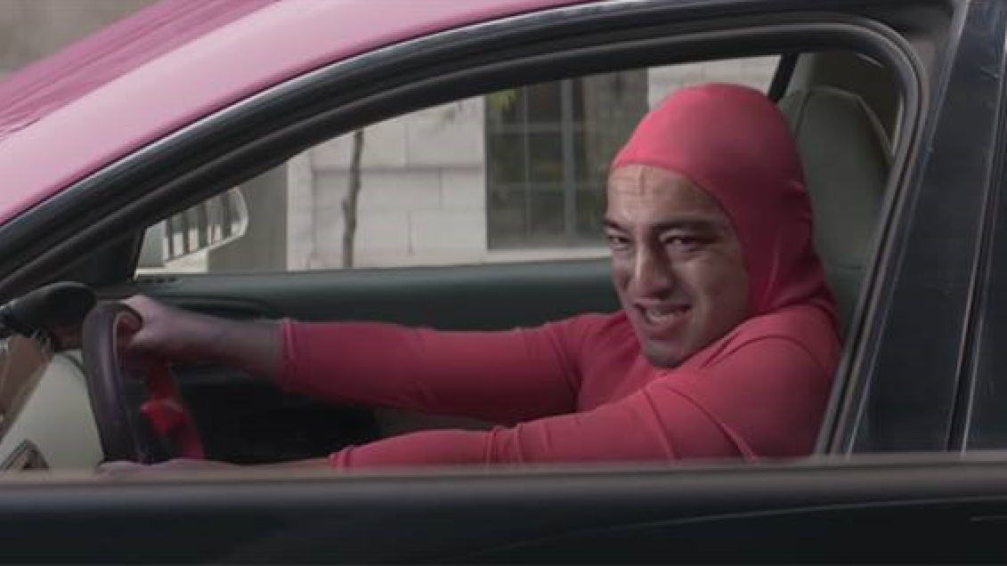 Weird guy in pink suit meme